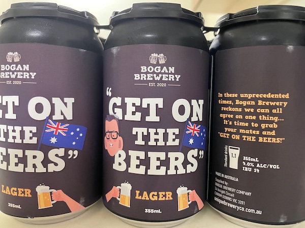 a six-pack of beer cans, branded 'GET ON THE BEERS' by Bogan Brewery. A description on the rightmost can reads 'In these unprecedented times, Bogan Brewery reckons we can all agree on one thing… It's time to grab your mates and GET ON THE BEERS!