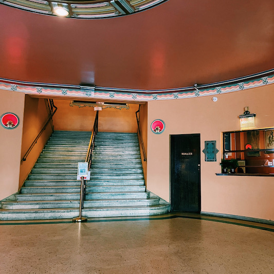 staircase and booking office downstairs at the Astor