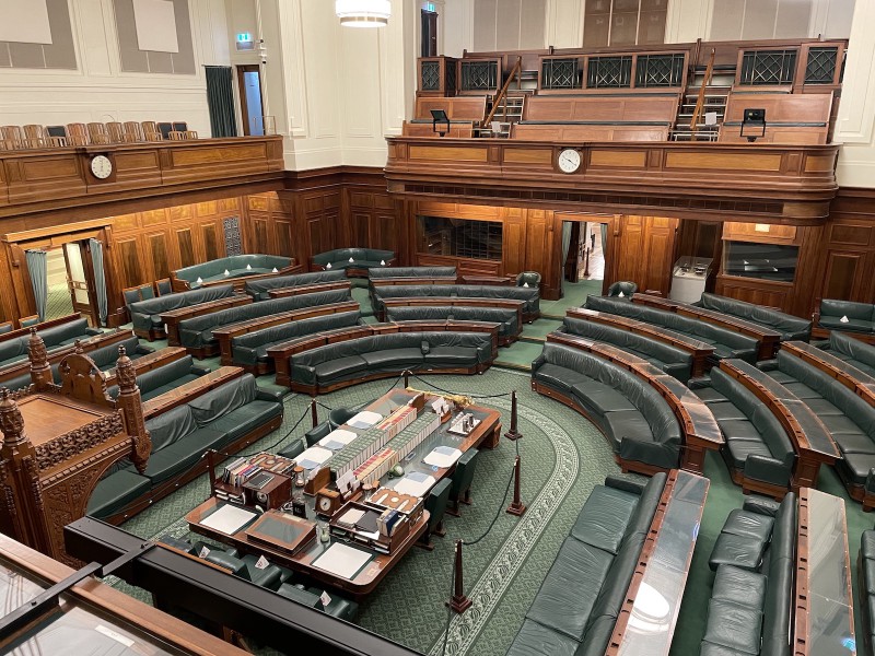 the House of Representatives in Old Parliament House, characterised by fine woodwork and green upholstery
